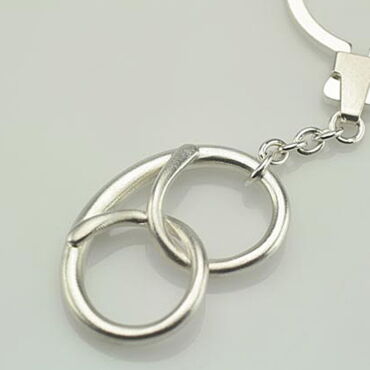 Schlüsselfreund "Brezel" aus 935er Silber mit hochwertiger Mechanik